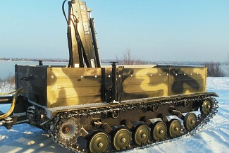 Двухзвенный снегоболотоход СТМ-7087 с КМУ